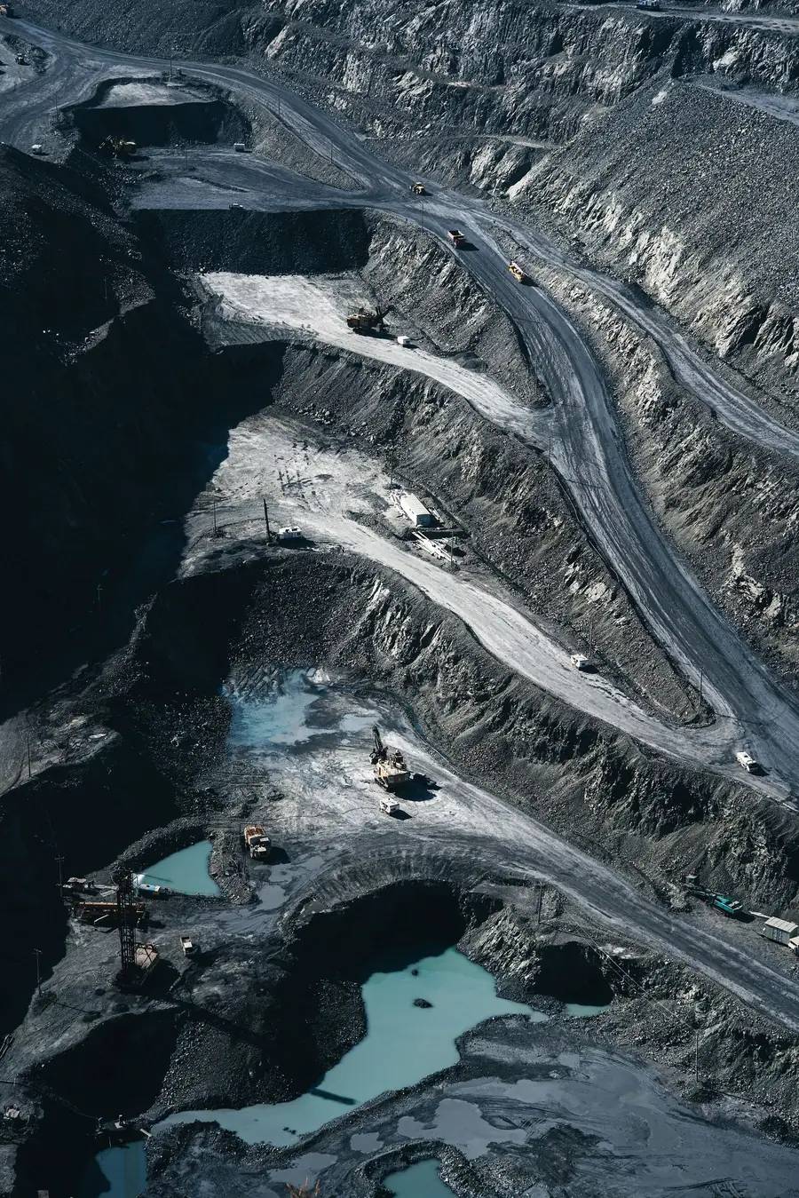 Aerial view of terraced open-pit mine benches