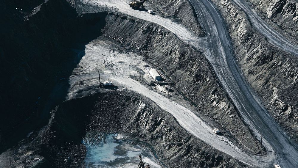 Aerial view of an open-pit mine with haul roads